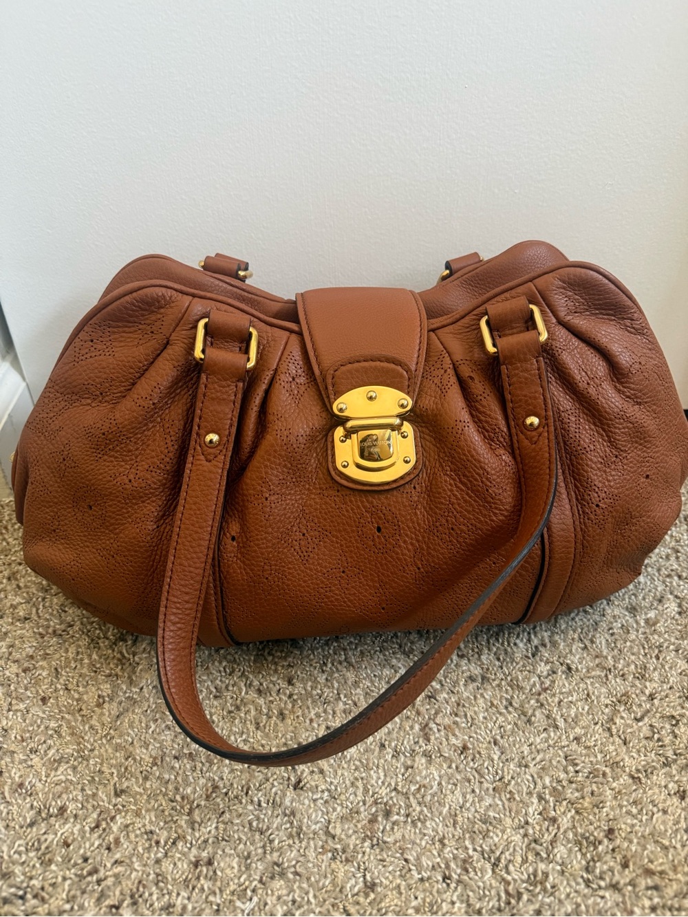 Authentic Louis Vuitton Monogram Mahina Lunar PM handbag in cognac brown leather